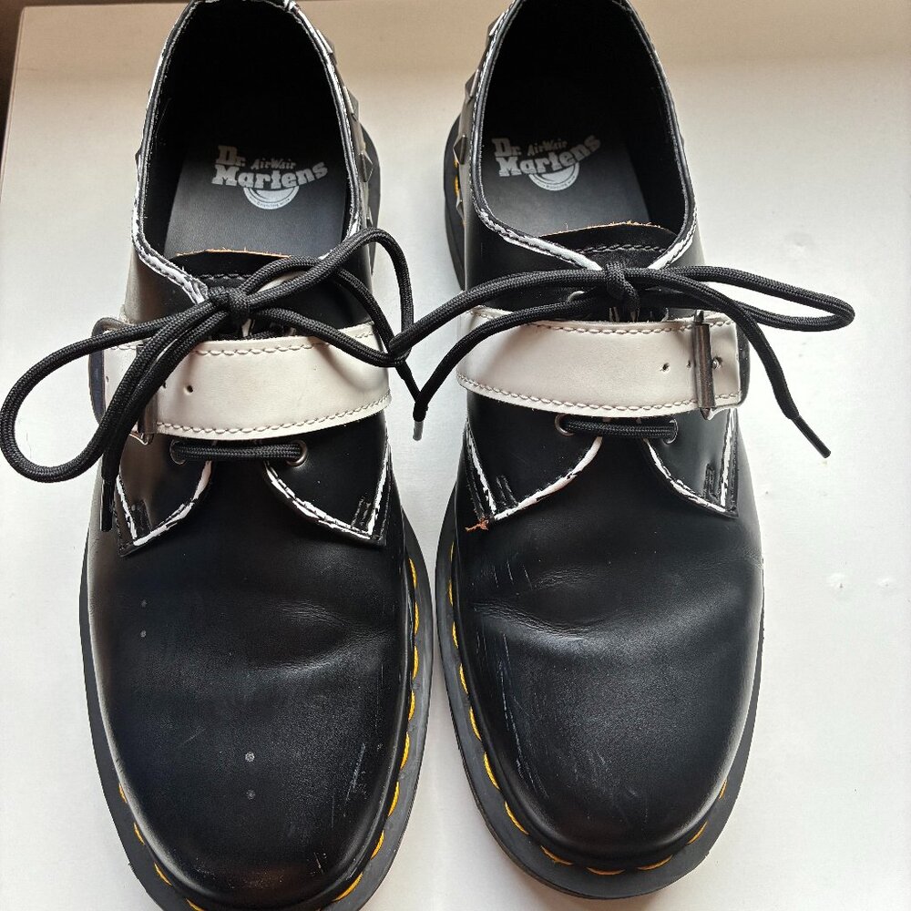 Dr. Martens oxfords with white buckle strap